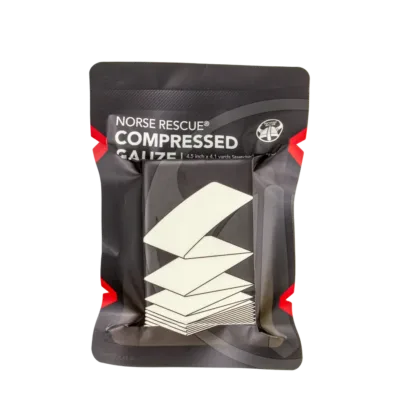 The NORSE RESCUE® Compressed Gauze Z-fold is crafted from high-quality cotton, designed for maximum absorption and stability. Vacuum-packed for compact storage, this gauze expands to cover large wounds, making it an ideal component beneath compression bandages to manage significant bleeding.