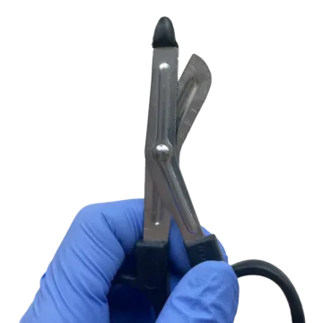 The EMT Shears, 4" (Mini), are compact yet powerful, capable of cutting through tough materials, including a penny, making them ideal for field use and emergency situations.