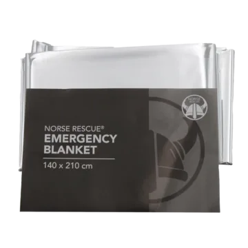 The NORSE RESCUE® Emergency Blanket is a crucial survival tool, designed to offer compact emergency protection in all weather conditions by retaining 90% of body heat. Made from high-quality materials comparable to more expensive foil blankets, it is waterproof, windproof, and incredibly lightweight, ensuring easy storage and reliability. The blanket features a 12 miu silver/silver construction, optimizing thermal efficiency and durability.