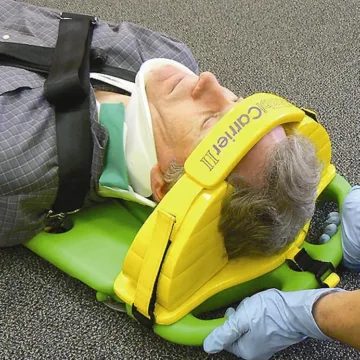 The CombiCarrierII Head Immobilizer (Yellow) is designed for seamless use with the CombiCarrierII, ensuring minimal lateral movement and maximizing neck and ear access while maintaining stabilization. Constructed from easy-to-clean vinyl-dipped NBR.