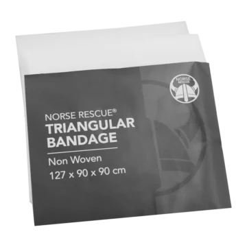 The NORSE RESCUE® Triangular Bandage is a single-use, multi-functional first aid essential, crafted from durable, non-woven material. Ideal for creating slings or supporting splints, this lightweight and comfortable bandage is individually wrapped for convenience, making it a staple in any first aid or emergency kit. - RE-11