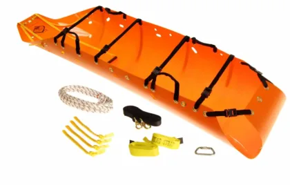 The Sked Rescue System is designed for the efficient transport of an immobile person. It includes a rollable plastic Sked Stretcher measuring approximately 2.44m x 0.90m, with handholds on each long side for secure handling. Four tension belts and additional straps at the top and bottom allow easy fastening and secure transportation.