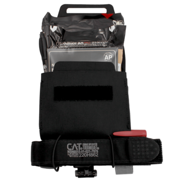 The NORSE RESCUE® Micro Bag in black is a compact and durable storage solution designed for quick access to essential medical supplies. Made from rugged CORDURA® fabric, it features a UTX safety buckle, pre-drilled holes for carrying tourniquets, and an elastic side band for expandable capacity. The quick-release handle and detachable inner pocket enhance accessibility, while the MOLLE system ensures secure attachment to gear. - BA-100037