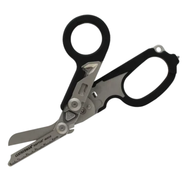 The Leatherman RAPTOR® RESCUE BLACK is a multifunctional rescue tool designed for first responders. Featuring heavy-duty foldable shears with a blunt safety tip, it efficiently handles tasks like cutting clothing. Integrated tools include a belt cutter, ring cutter, oxygen tank wrench, glass breaker, and ruler, all securely stored in a compact plastic sheath with a pocket clip for easy access. - EE-100102